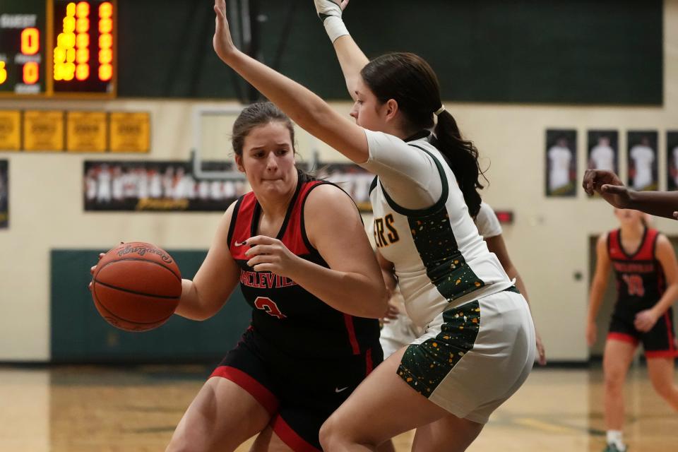 Circleville’s Maddie Blakeman dribbles around Hamilton Township’s Logan Baker during their game Jan. 23.