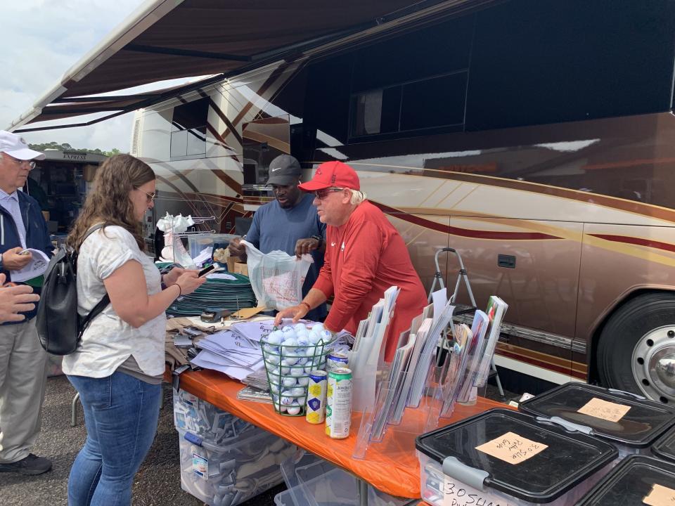 John Daly selling gear at the Hooters near Augusta National has become an annual tradition during Masters week. (Yahoo Sports)
