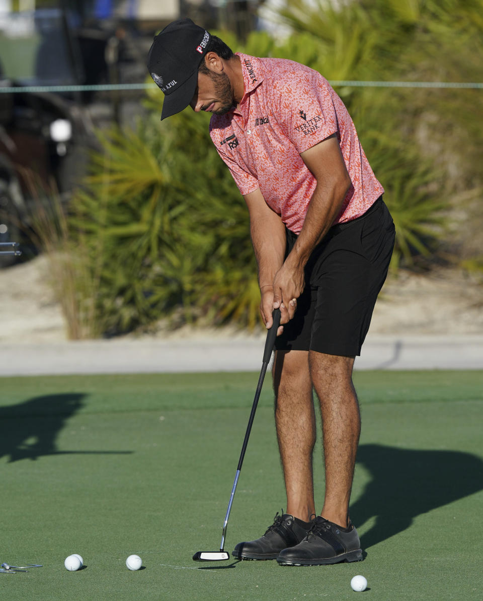 Abraham Ancer, of Mexico, practices his putt after a round of the Pro-Am tournament ahead of the Hero World Challenge PGA Tour at the Albany Golf Club, in New Providence, Bahamas, Wednesday, Dec. 1, 2021.(AP Photo/Fernando Llano)