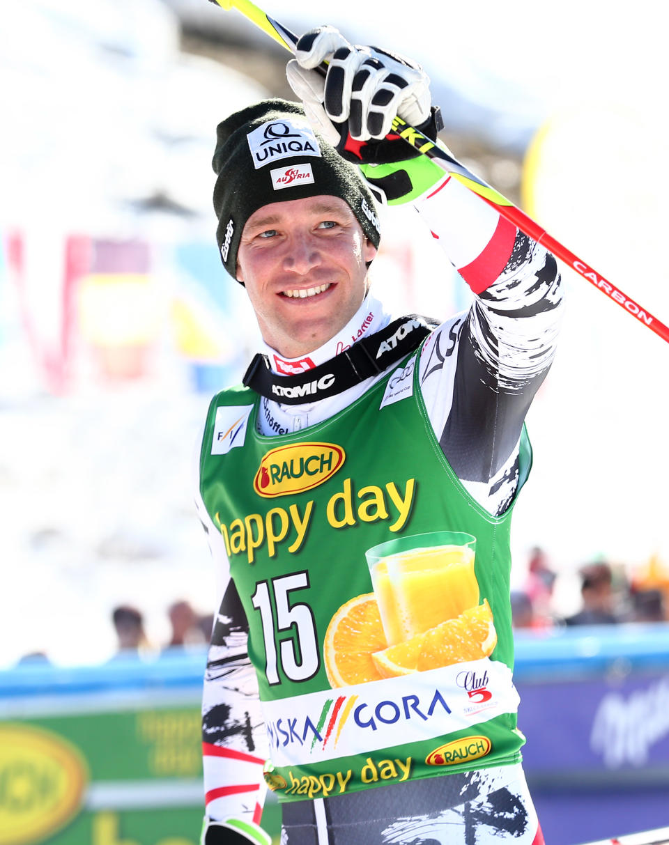 Benjamin Raich of Austria celebrates his second placed after an alpine ski men's World Cup giant slalom, in Kranjska Gora, Slovenia, Saturday, March 8, 2014. (AP Photo/Giovanni Auletta)
