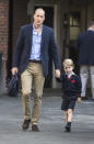 Prince George arrives for his first day at Thomas's Battersea in 2017, with his father William. [Photo: PA]