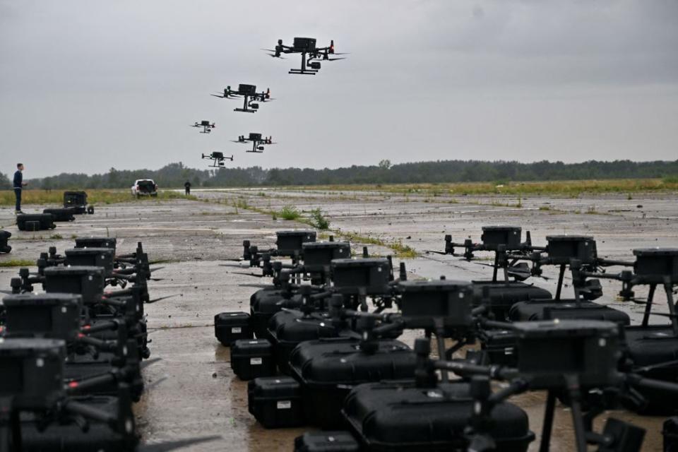 DJI Matrice 300 reconnaissance drones, bought through the 'Army of Drones' program, are seen during test flights in the Kyiv region on Aug. 2, 2022, prior to being sent to the front line. (Sergei Supinsky/AFP via Getty Images)