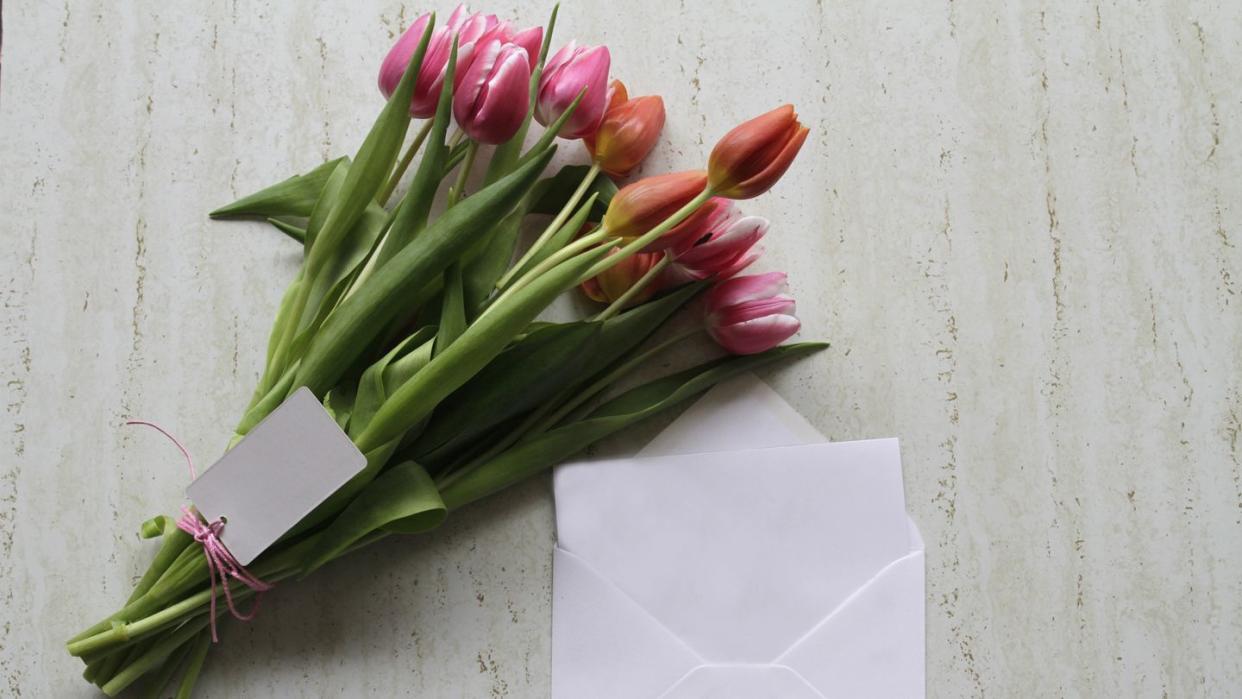 pink tulips, letter and envelope