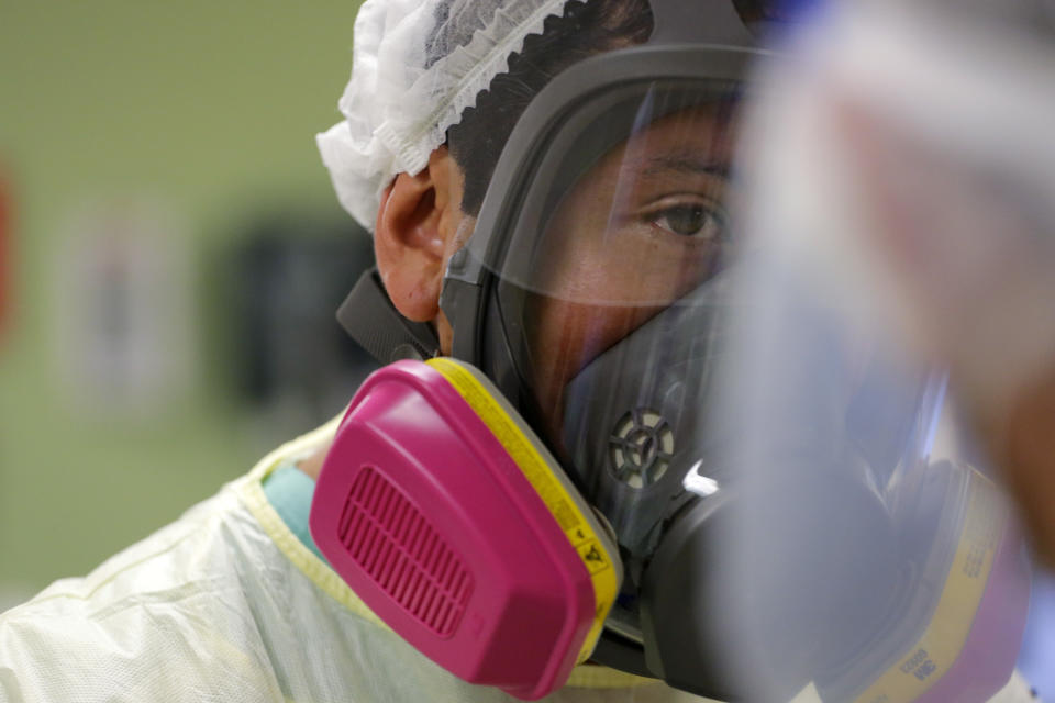 Medical personnel watch over COVID-19 patients at DHR Health, Wednesday, July 29, 2020, in McAllen, Texas. (AP Photo/Eric Gay)