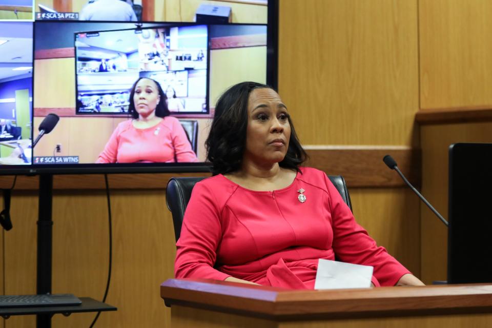 ATLANTA, GA - FEBRUARY 15: Fulton County District Attorney Fani Willis takes the stand as a witness during a hearing in the case of the State of Georgia v. Donald John Trump at the Fulton County Courthouse on February 15, 2024 in Atlanta, Georgia. Judge Scott McAfee is hearing testimony as to whether Willis and Special Prosecutor Nathan Wade should be disqualified from the case for allegedly lying about a personal relationship. (Photo by Alyssa Pointer-Pool/Getty Images)