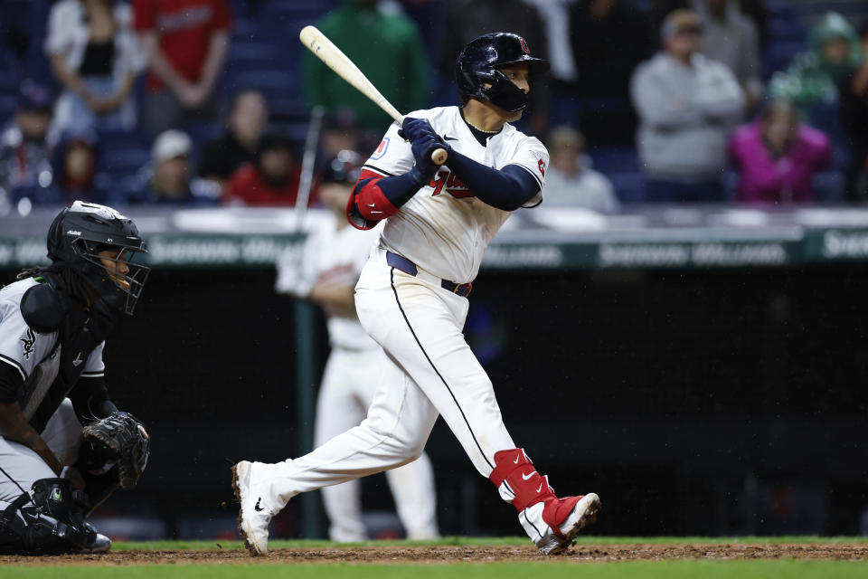 Cleveland Guardians' Bo Naylor watches his single that drove in the winning run off Chicago White Sox pitcher Bryan Shaw during the 10th inning of a baseball game Wednesday, April 10, 2024, in Cleveland. (AP Photo/Ron Schwane)