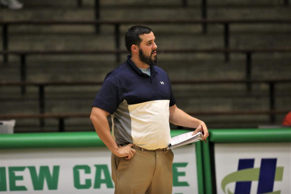 Delta volleyball interim head coach Josh Collins in the team's sectional first round match against New Castle at New Castle High School on Thursday, Oct. 13, 2022.