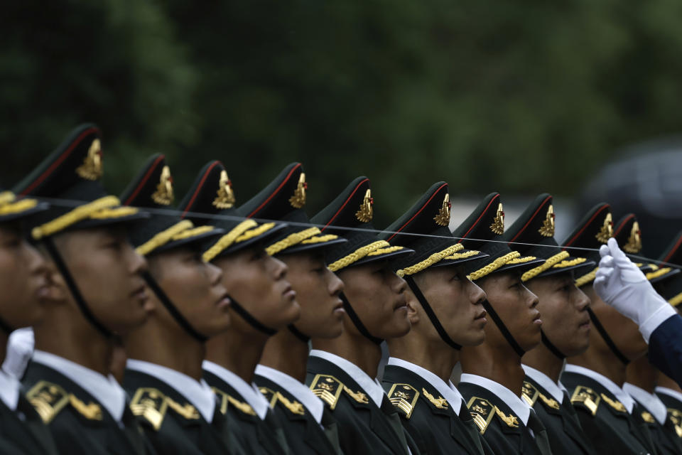 Honour guard members line up before a welcome ceremony for Egyptian President Abdel Fattah al-Sisi at the Great Hall of the People in Beijing, Wednesday, May 29, 2024. (Tingshu Wang, Pool Photo via AP)