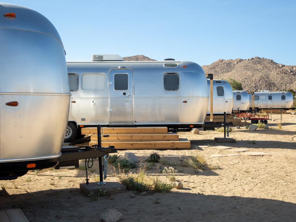 A row of Airstream trailers at Autocamp's Joshua Tree location.