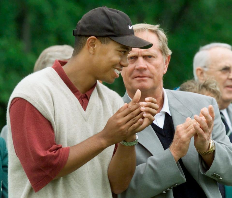 NCL MEMORIAL 5/29 S : DUBLIN.OH.,29MAY00 - Tiger Woodes, left, and Jack Nicklaus chat during the awards presentation on the 18th tee during the Memorial Tournament at Muirfield Village Golf Club, May 29, 2000. ncl/Photo by Neal C. Lauron