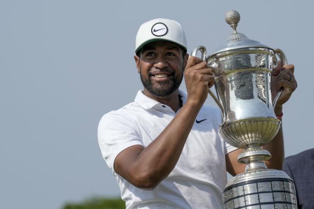 Tony Finau holds the championship trophy after his victory in the final round of the Mexico Open golf tournament in Puerto Vallarta, Mexico, Sunday, April 30, 2023. The victory was Finau’s fourth in the last nine months. | Moises Castillo, Associated Press