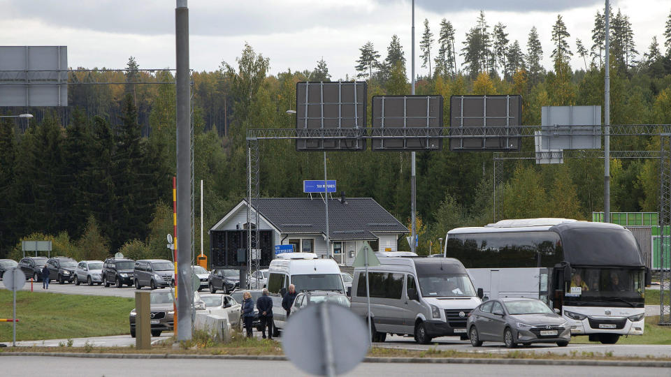 Vehicles wait to cross the border from Russia into Finland at the Nuijamaa border checkpoint in Lappeenranta, Finland, September 22, 2022. / Credit: LAURI HEINO/Lehtikuva/AFP/Getty