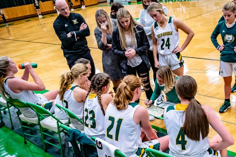 Rock Bridge head coach Jill Nagel works out a play during a time out.