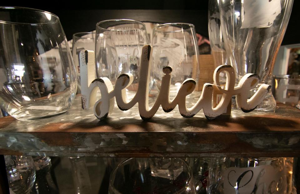 Holiday gift ideas are displayed throughout That's What She Shed Boutique, shown Tuesday, Nov. 23, 2021.