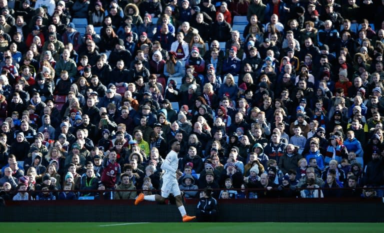 Liverpool's striker Daniel Sturridge celebrates scoring his team's first goal during an English Premier League football match against Aston Villa on February 14, 2016