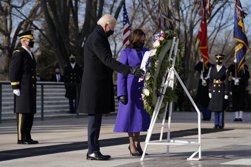 President Joe Biden and Vice President Kamala Harris participate in a wreath laying ceremony at the Tomb of the Unknown Soldier at Arlington National Cemetery in Arlington, Va.on Jan. 20, 202. (Evan Vucci/AP)