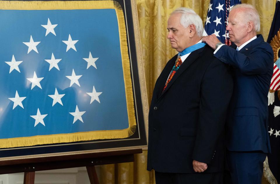 During a Tuesday ceremony at the White House, US President Joe Biden awards the Medal of Honor to retired US Army Spc. Five Dwight W. Birdwell for his actions in the Vietnam War.