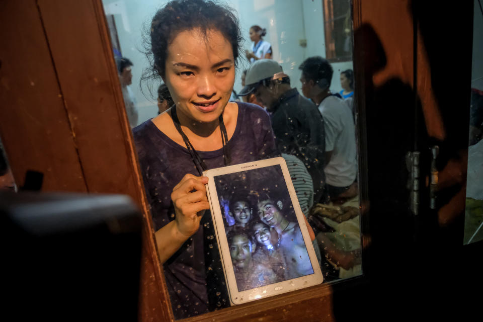 There were jubilant scenes from families of the boys, who were sent images of the group inside the cave. source: Getty