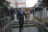 Leader of Macedonian ruling party VMRO-DPMNE and former Prime Minister Nikola Gruevski leaves a polling station with his wife Borkica after casting his vote during elections in Skopje, Macedonia, December 11, 2016. REUTERS/Ognen Teofilovski