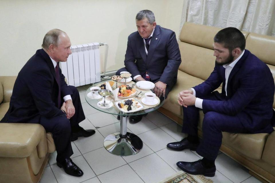President Vladimir Putin met with Khabib Nurmagomedov and his father Abdulmanap (Reuters)