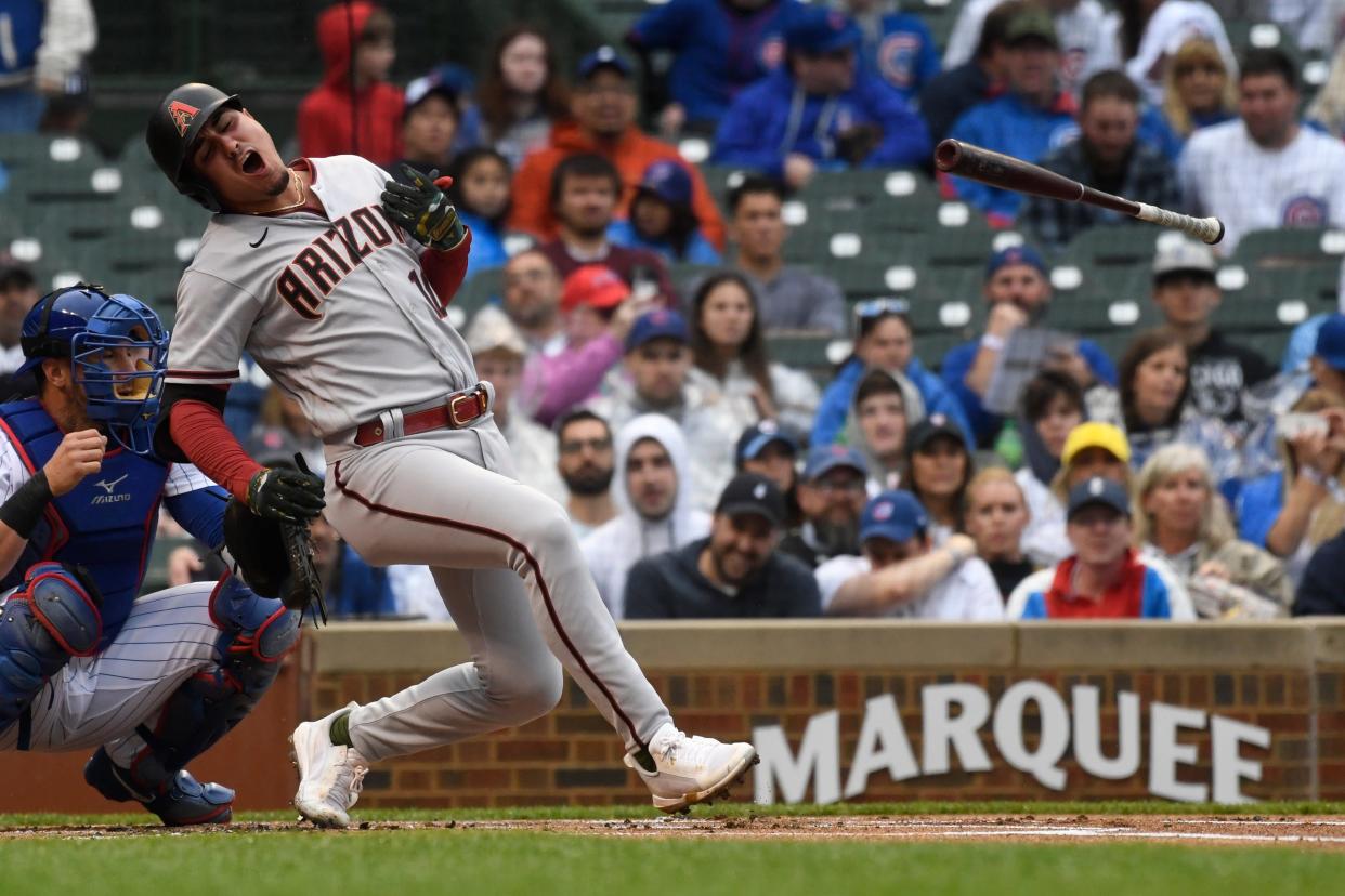 May 21, 2022; Chicago, Illinois, USA;  Arizona Diamondbacks third baseman Josh Rojas (10) strikes out swinging during the first inning against the Chicago Cubs at Wrigley Field. Mandatory Credit: Matt Marton-USA TODAY Sports