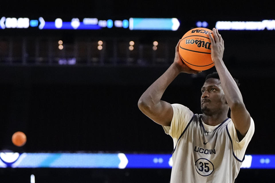 Connecticut forward Samson Johnson practices for their Final Four college basketball game in the NCAA Tournament on Friday, March 31, 2023, in Houston. Connecticut and Miami play on Saturday. (AP Photo/David J. Phillip)