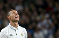 Football Soccer - Real Madrid v Borussia Dortmund - UEFA Champions League - Santiago Bernabeu stadium, Madrid, Spain - 7/12/16 Real Madrid's Cristiano Ronaldo reacts during the match. REUTERS/Juan Medina