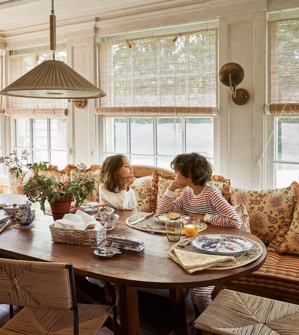 Beatrice and her older brother, Nico, sit in the light-flooded breakfast nook.