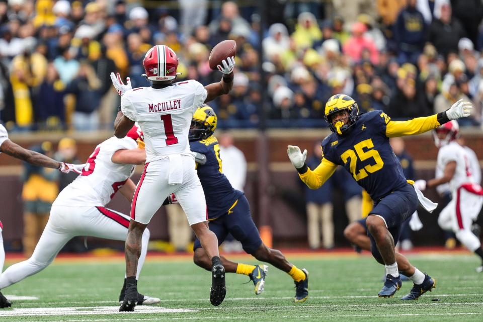 Indiana wide receiver Donaven McCulley makes a pass against Michigan during the first half at Michigan Stadium in Ann Arbor on Saturday, Oct. 14, 2023.