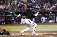 Arizona Diamondbacks' Alek Thomas watches his two-run single against the San Francisco Giants during the second inning of a baseball game Wednesday, July 6, 2022, in Phoenix. (AP Photo/Ross D. Franklin)