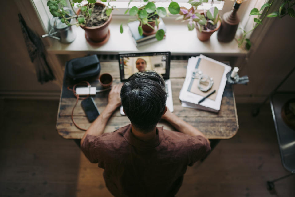 Man working at his desk at home