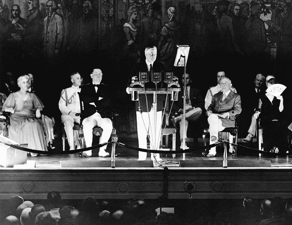 FILE - In this June 16, 1931, file photo, thousands gathered about the Grecian Tomb of President Harding and Mrs. Harding, as President Herbert Hoover, center, delivers the dedication address at the memorial in Marion, Ohio. The grandson of U.S. President Warren G. Harding has gone to court seeking to dig up the Republican's remains from the presidential memorial where they have lain since 1927. (AP Photo)