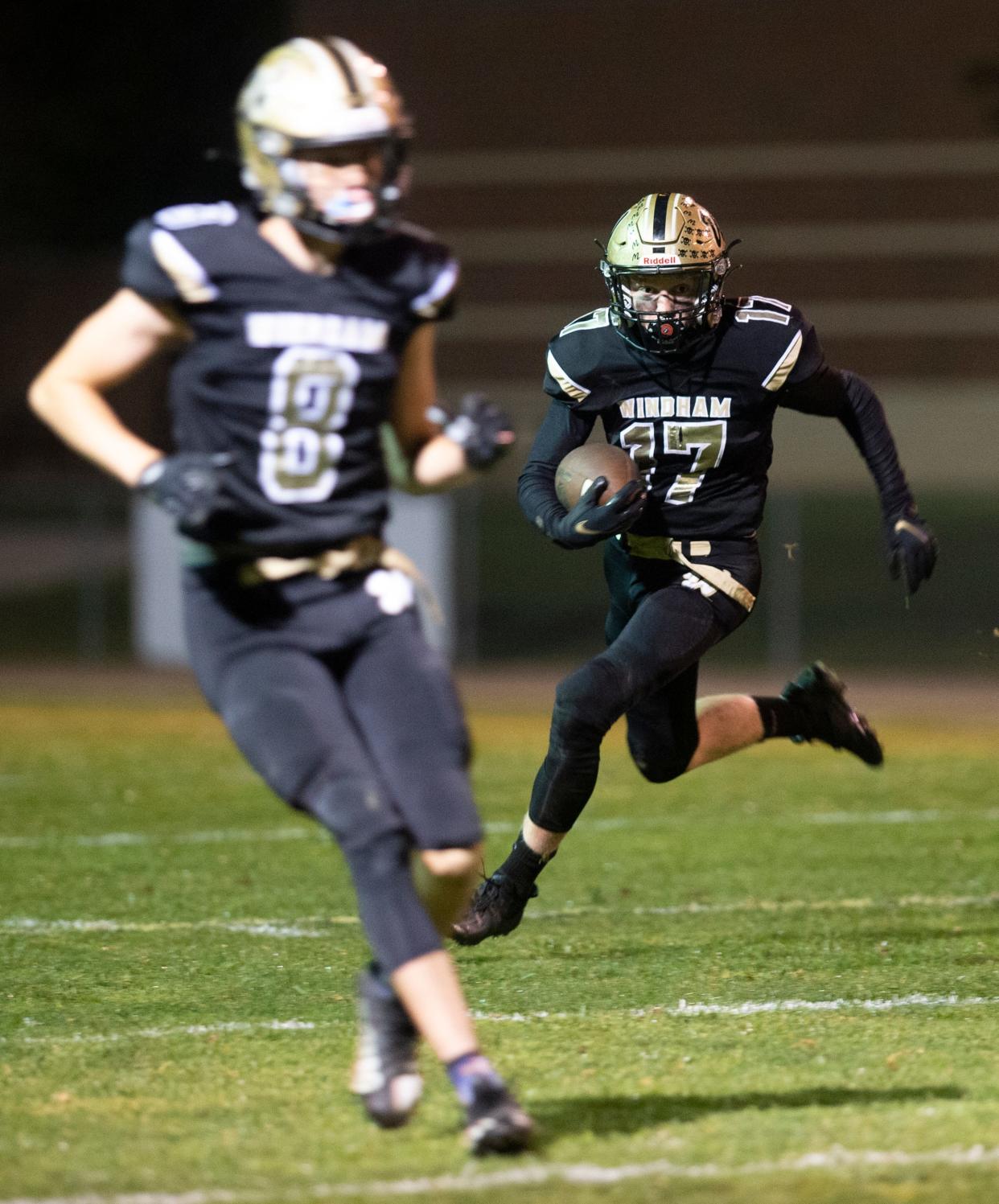 Windham hosted the Southeast, 20-48. Chase Eye with possession, Lucas Churchill gets ready to block for Eye.