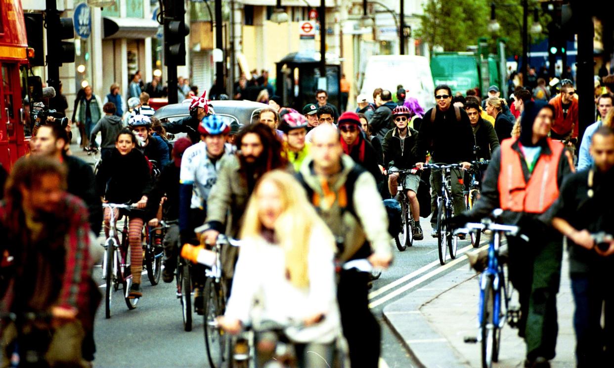 <span>Critical Mass cyclists taking part in May Day 2002 protests in London.</span><span>Photograph: David Levene/The Guardian</span>