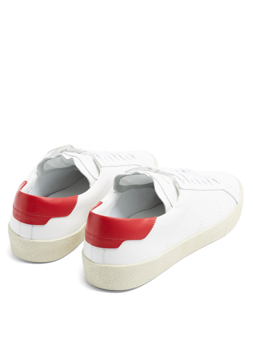 <p>Saint Laurent's take on the classic low-top tennis shoe, these 'court' sneakers scream (AHHHHH) subtle luxury; with the only colour coming in the form of the bright red heel tabs and an almost-invisible gold logo on the tongues.</p><p><em>Saint Laurent Court Classic Low-Top Leather Trainers, £340, <a rel="nofollow noopener" href="http://www.matchesfashion.com/products/Saint-Laurent-Court-Classic-low-top-leather-trainers-1085963" target="_blank" data-ylk="slk:matchesfashion.com;elm:context_link;itc:0;sec:content-canvas" class="link ">matchesfashion.com</a></em></p>