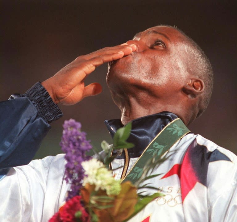 US athletics legend Carl Lewis won four long jump Olympic titles but he says the event has lost its gloss (PATRICK HERTZOG)