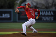 CORRECTS POSITION TO STARTING PITCHER INSTEAD OF DESIGNATED HITTER - Los Angeles Angels starting pitcher Shohei Ohtani throws to the plate during the first inning of a baseball game against the Tampa Bay Rays, Wednesday, May 5, 2021, in Anaheim, Calif. (AP Photo/Mark J. Terrill)