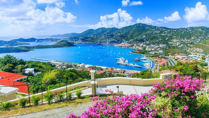 <span class="article__caption">St. Thomas, U.S. Virgin Islands, the Caribbean, where you can sail, swim, snorkel, dive, hike, and bike.</span> And the sky and water are blue. (Photo: SCStock/Getty)