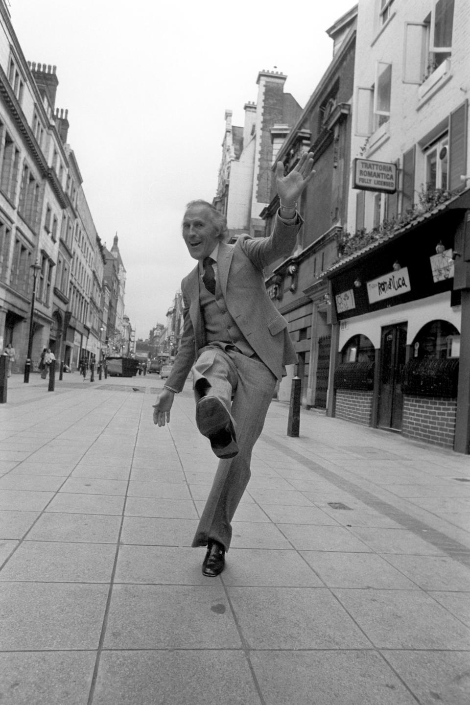 <p>Sir Bruce dancing in a West End street in 1977 after announcing he’ll star in a new musical, The Bricusse and Newley Travelling Music Show. </p>