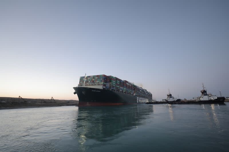 A view shows the container ship Ever Given, one of the world's largest container ships, after it was partially refloated, in Suez Canal