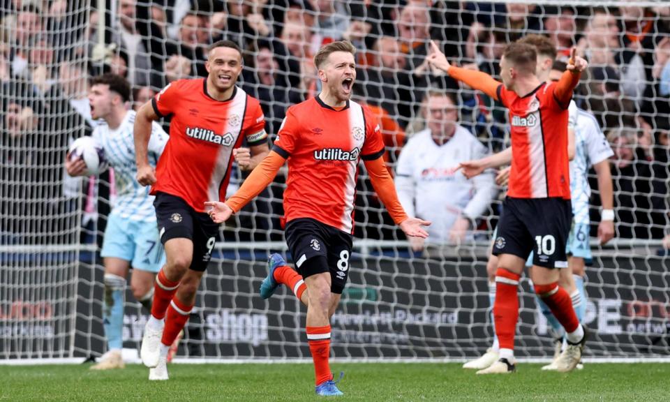 <span>Luke Berry celebrates scoring Luton’s goal to earn a 1-1 draw with Nottingham Forest.</span><span>Photograph: David Klein/Reuters</span>