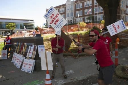 Teachers walk the picket line as they strike outside Garfield High School in Seattle, Washington September 9, 2015. REUTERS/Matt Mills McKnight