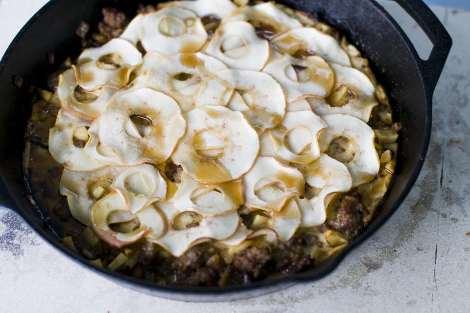 This Aug. 26, 2013 photo shows a sausage and apple Dutch baby in Concord, N.H. (AP Photo/Matthew Mead)