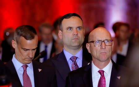 Dan Scavino (C), who was executive vice president and general manager at the Trump Organization, from 2003 to 2013, was appointed his social media director in February. In July, Michael Glassner (R) was appointed National Political Director. REUTERS/Lucas Jackson