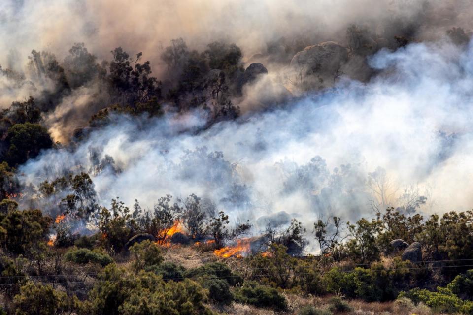 PHOTO: A brush fire dubbed the Highland fire, burns along Highway 371 on Oct. 31, 2023 in Aguanga, Calif. (Irfan Khan/Los Angeles Times via Getty Images, FILE)