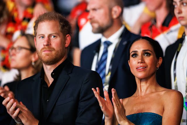 <p>Joshua Sammer/Getty</p> Prince Harry and Meghan Markle during the closing ceremony of the 2023 Invictus Games.