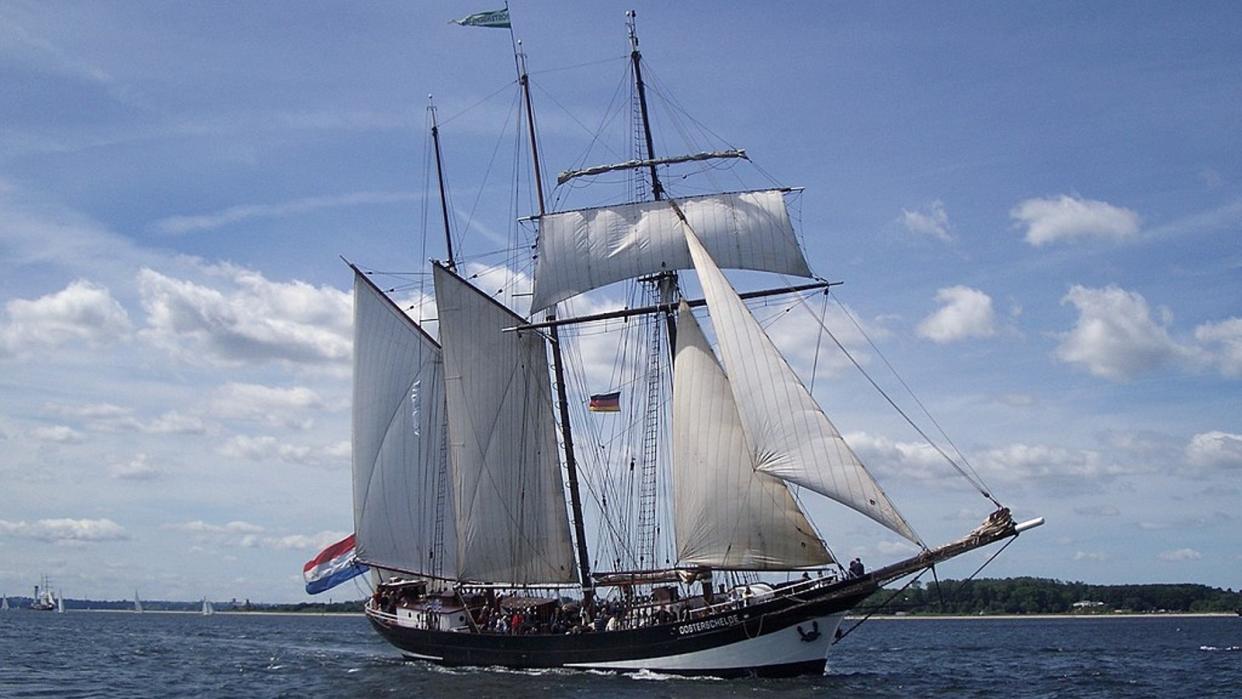  A tall ship sailing on water 