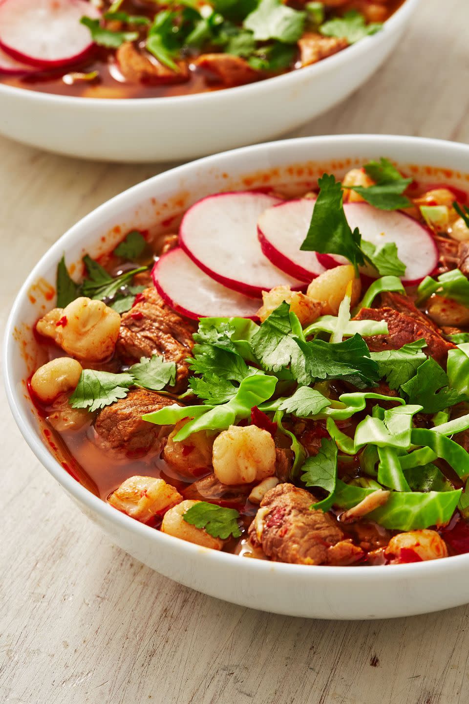 <p>Don't let the time commitment on this fantastically flavorful pozole recipe scare you. It's as easy as bringing water to a boil and letting it simmer away while you multitask on other things going on in your life. The longer you let the soup simmer, the better it will be. With time, the meat will turn tender, soft, and buttery, the aromas will deepen, and the color will become as rich as the soup tastes.</p><p>Get the <strong><a href="https://www.delish.com/cooking/recipe-ideas/a30875851/pozole-recipe/" rel="nofollow noopener" target="_blank" data-ylk="slk:Best-Ever Pozole recipe.;elm:context_link;itc:0;sec:content-canvas" class="link ">Best-Ever Pozole recipe.</a></strong></p>