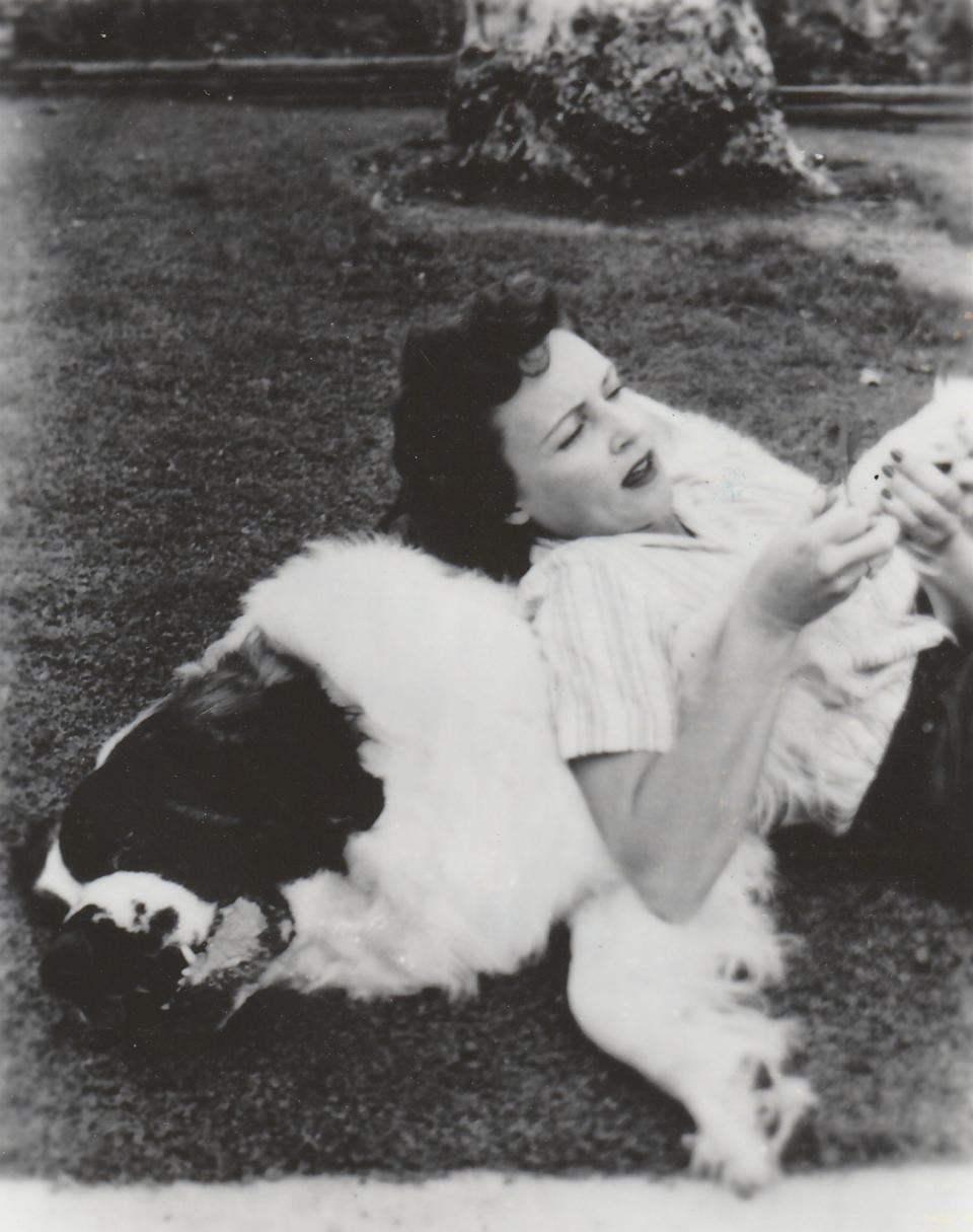 Betty White relaxing with her dog