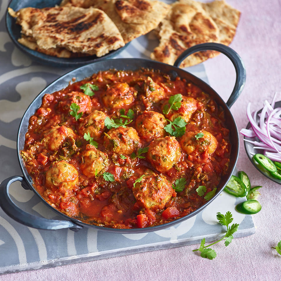 Chickpea Dumplings in Curried Tomato Sauce